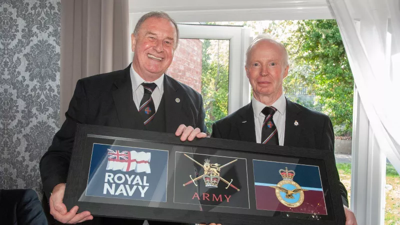 Lincolnshire Freemasons with a banner of all the UK Armed Forces Logos