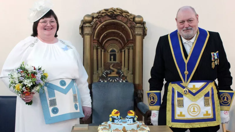 Mark and Tanya on their wedding day in Masonic regalia