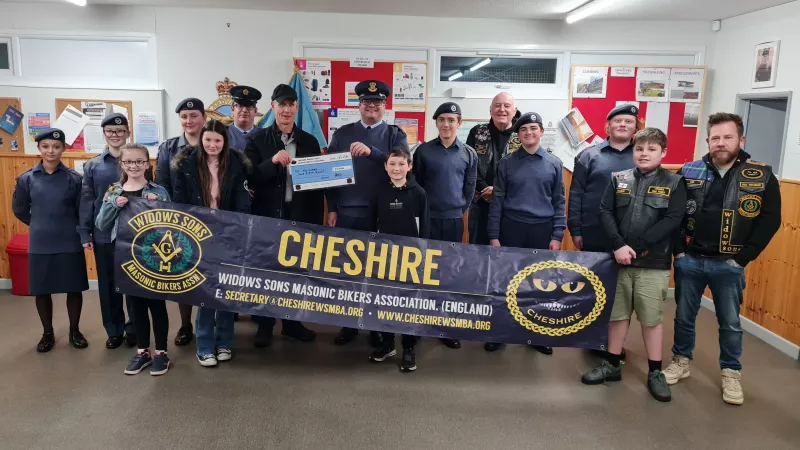 Cheshire Freemasons with local squadron who have been donated a Flight Simulation system