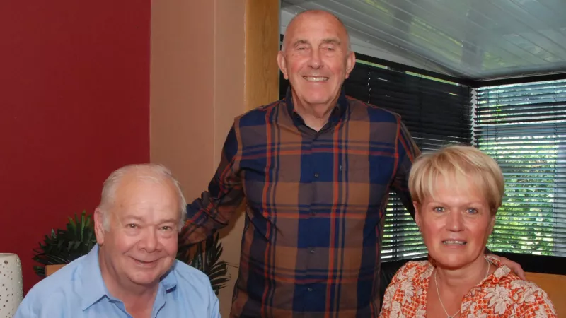 Scunthorpe Freemason Dave Gibson, left, hands the £250 donation from St Lawrence Lodge to Gill Ayling watched by husband Steve.