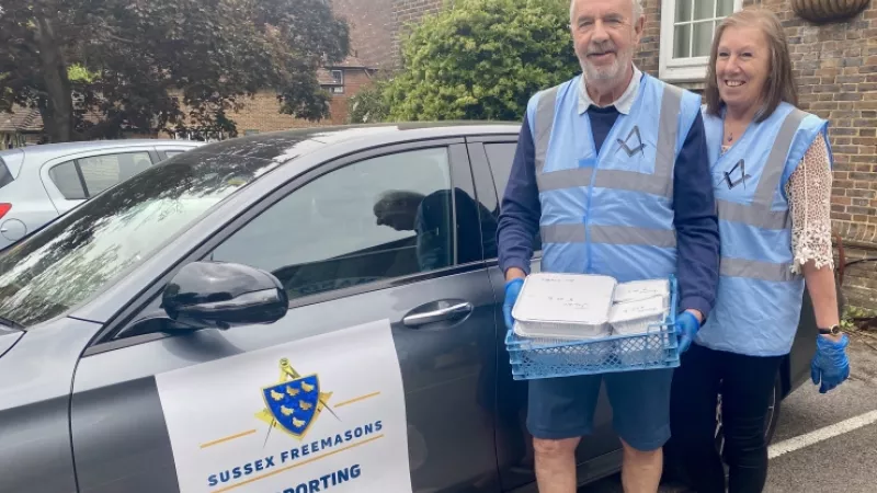 Graham & Jan Watkins - Horsham Freemasons with a hot food delivery