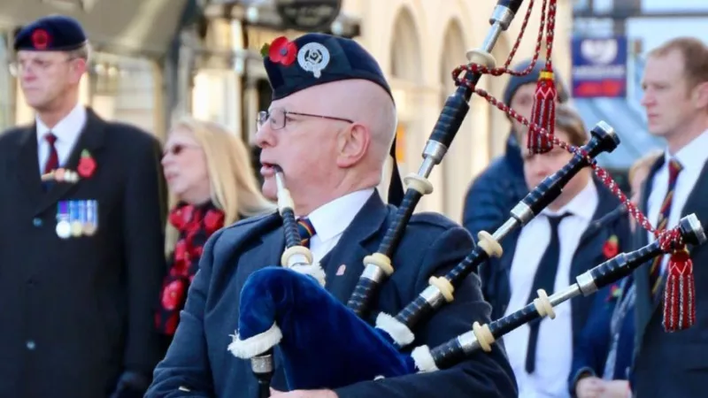 Cumbrian Freemason playing bagpipes