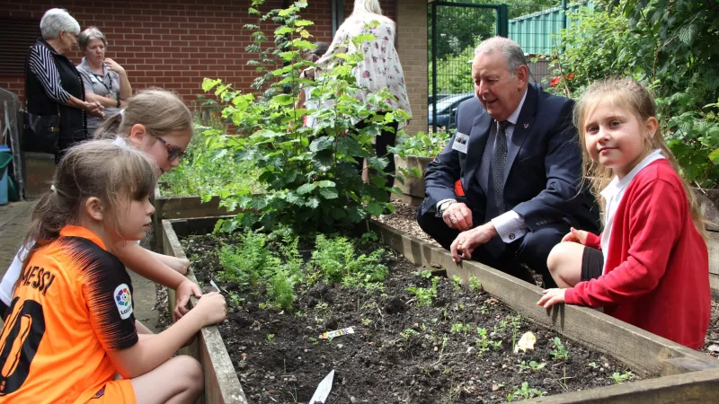 Head of Yorkshire Freemasons West Riding with children supported by the grant