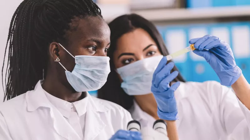 Two women researchers working at The Freemasons Fund Surgical Research in the UK