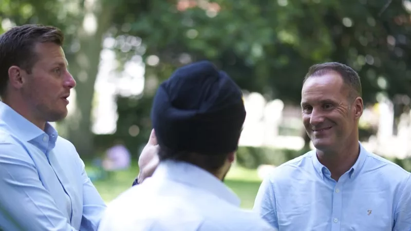 Three Freemasons are chatting in the park