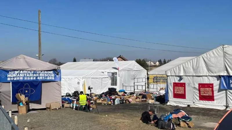 Piles of donated items left at the refugee camp