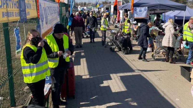 Aid workers meeting refugees arriving from Ukraine