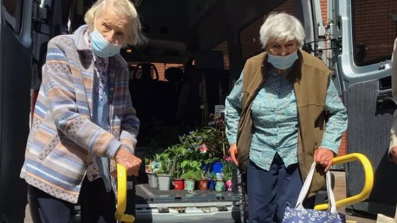 Residents Janet Wigmore and Pat Johns enjoy themselves as they show the plants they have chosen to put in Cadogan Court’s garden and green house.