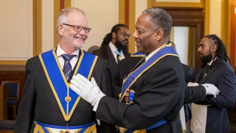 Two Freemasons talking after a Lodge meeting