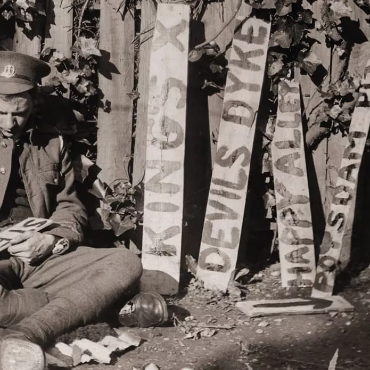 British Soldier Paints Trench Signs