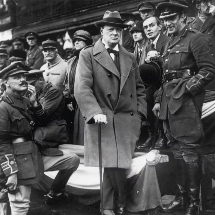 Churchill watching the 47th (1/2nd London) Division from the grandstand of the Grand Palais de Lille, 22 October 1918
