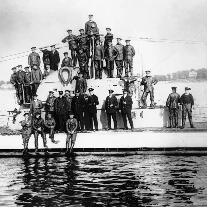 German crew on U-Boat in Newport Harbor, Rhode Island. After a brief visit with local Naval officers and a peek of the local newspapers, the U-Boat departed and on the very next day sank 5 European merchant ships off the coast of Nantucket, Rhode Island, 7 October 1916