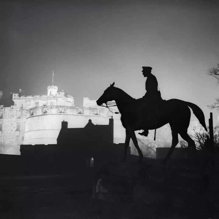Statue of Haig (1861-1928) silhouetted against floodlit Edinburgh Castle, 19 March 1935