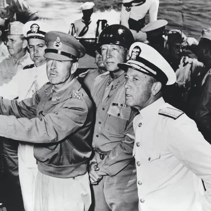 General Sir Harold Alexander, Commander of the 18th Army Group, with General George Patton and Rear Admiral Alan G. Kirk, July 1943