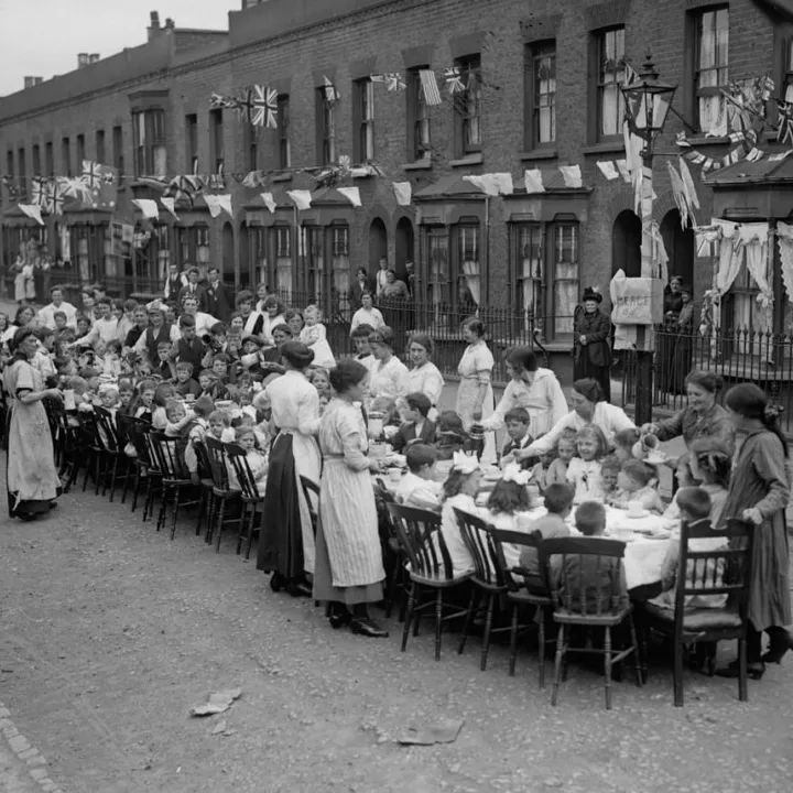 A children’s tea party in an East End Street, London, celebrating the Treaty of Versailles, c.1919