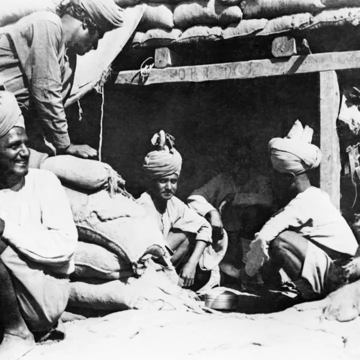 Desert Men of the 123rd Outram’s Rifles sitting outside their dugout in Palestine, December 1917