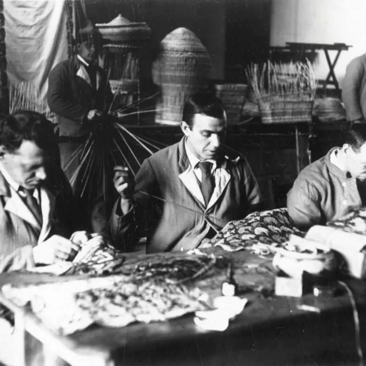 Putting liners into sewing baskets in the workshops of the Fulham Road branch of the Lord Roberts Memorial Workshops, c.1918